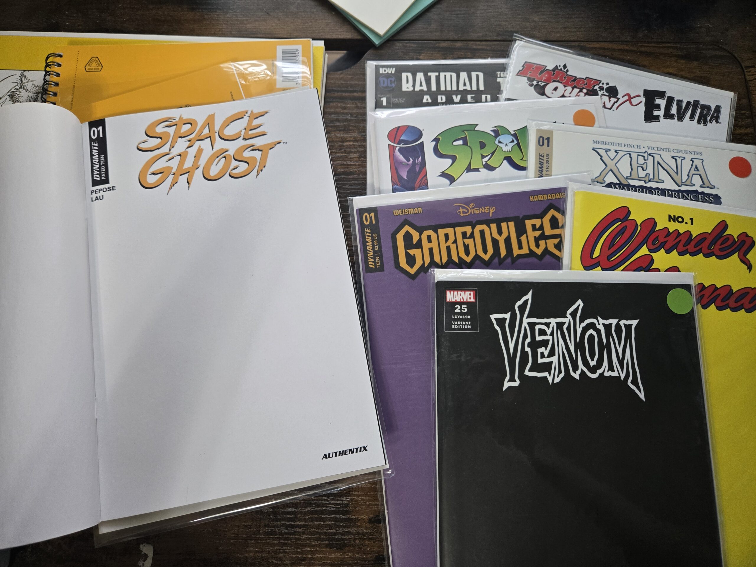 Piles of blank sketch covers and sketch books
